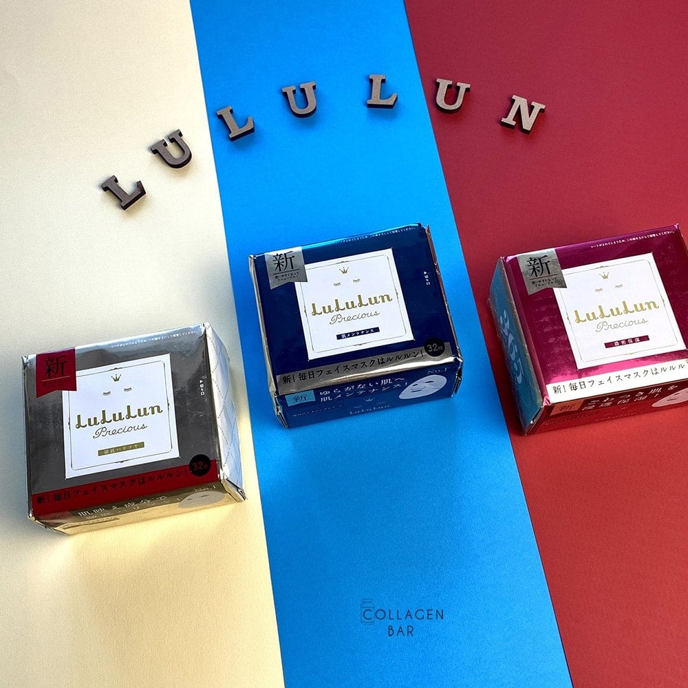 Маски LuLuLun Precious RED, GREEN і WHITE на смугастому тлі та дерев'яними літерами, якими викладено слово LULULUN